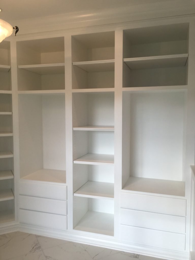 Custom Built-In Cabinetry and Wainscoted Storage Surround