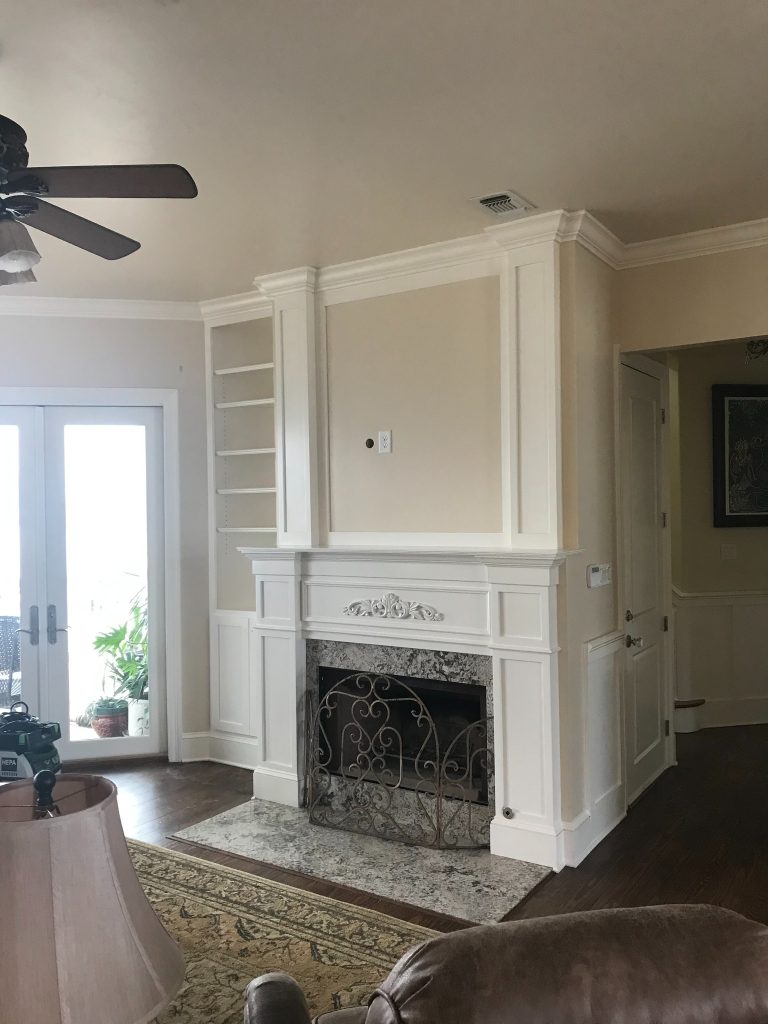 Elegant Living Room Cabinetry Featuring Display Shelves and Lower Storage