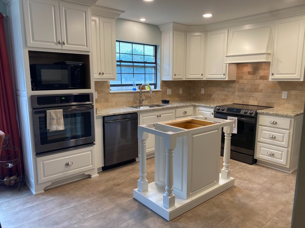 Classic White Kitchen Cabinetry with Center Island Base Installation