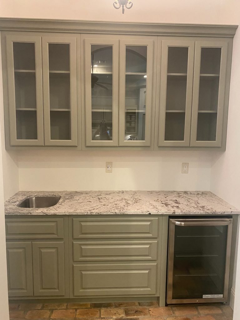 Custom Upper Glass-Front Cabinets with Coordinated Lower Storage and Beverage Cooler