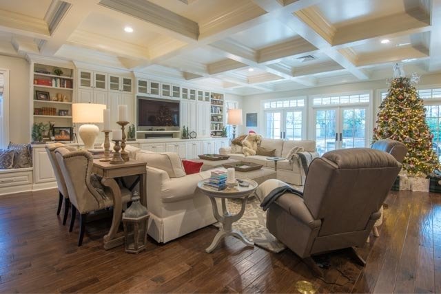 Elegant Living Room with Wall-to-Wall Cabinetry and Architectural Ceiling Detail