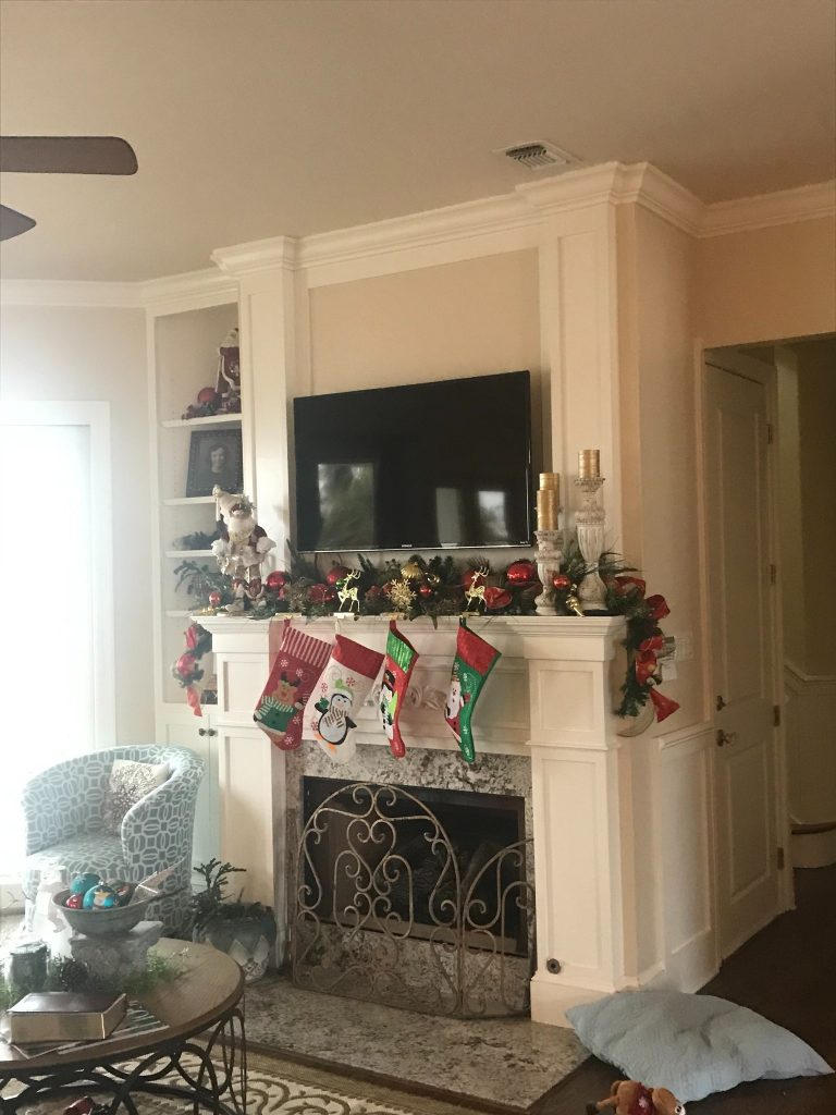 Wall-to-Wall Built-In Storage Surrounding Fireplace and Media Center