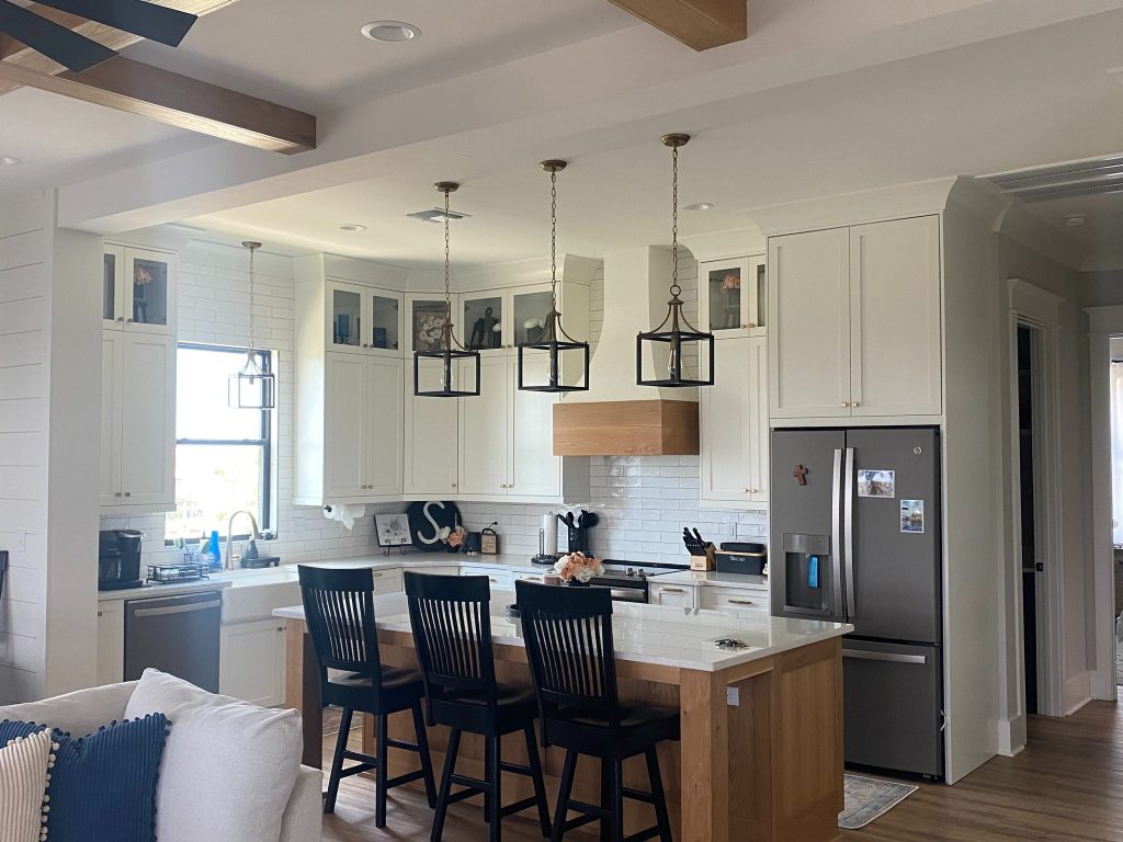 Bright, Contemporary Kitchen Island Featuring Quartz Countertop
