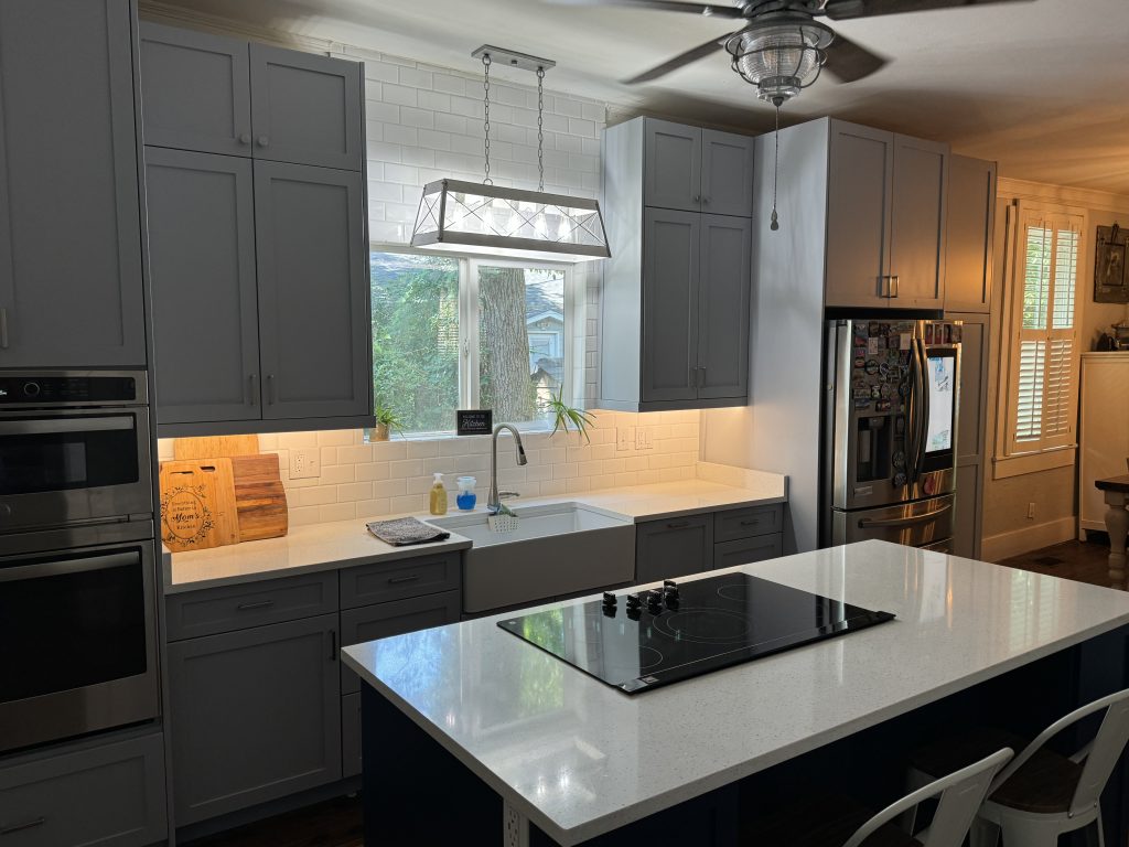 Stylish Kitchen Remodel with Shaker Cabinets and Cooktop Island