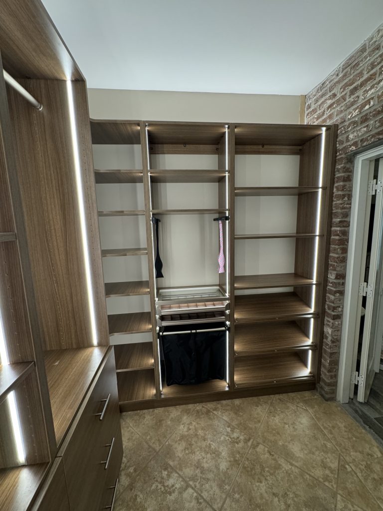 Sleek Storage System Featuring Pull-Out Accessories