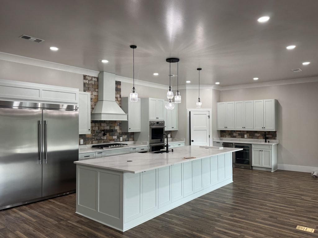 Modern Kitchen with Large Island and Stainless Steel Appliances